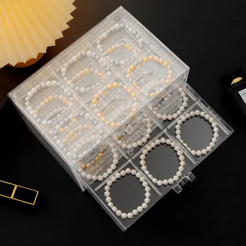Organiseur à bijoux transparent à 5 tiroirs